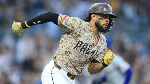 Fernando Tatis Jr. (23) of the San Diego Padres runs to first base after hitting an RBI double during the fourth inning of a game against the Texas Rangers at Petco Park on Sunday, July 6, 2025, in San Diego. (Sean M. Haffey/Getty Images/TNS)