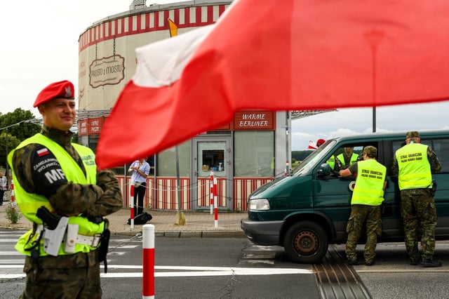 Polish border guards check a vehicle at Polish-German border, as Poland start controls on borders with Germany, Lithuania over migration, near the German town of Frankfurt an der Oder, in Slubice, Poland, July 7, 2025. REUTERS/Lisi Niesner         TPX IMAGES OF THE DAY