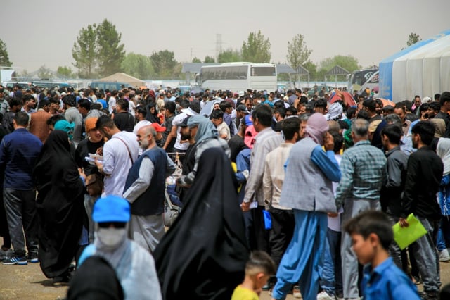 Afghans in their thousands have streamed over the border from Iran at the Islam Qala border point in Afghanistan's Herat province in recent weeks