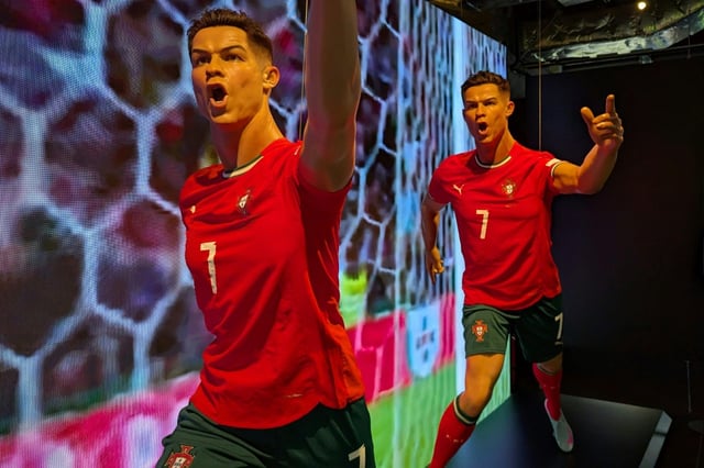 Life-sized statues of Cristiano Ronaldo at the opening of the CR7 LIFE Museum in Hong Kong