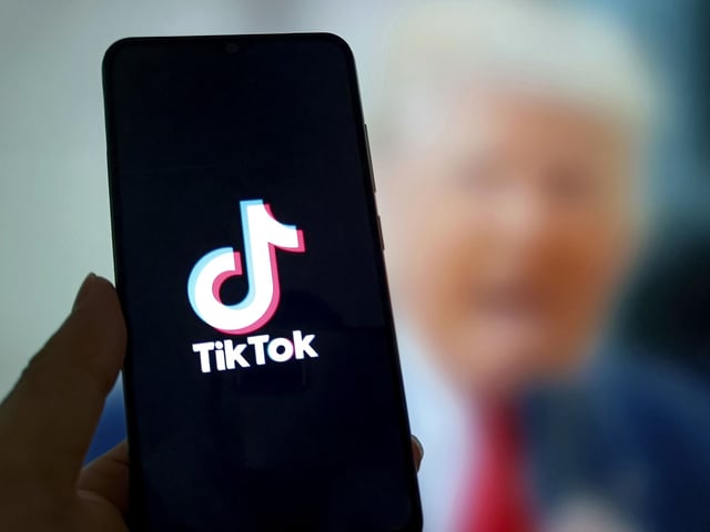 SUQIAN, CHINA - MARCH 27: In this photo illustration, the logo of TikTok is displayed on a smartphone screen on March 27, 2025 in Suqian, Jiangsu Province of China. US President Donald Trump announced on April 4 that he will again postpone enforcement of the TikTok sale-or-ban law for 75 days. (Photo by VCG/VCG via AP )