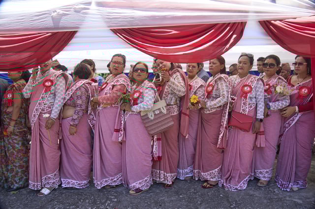 Pro-monarchy supporters line up to offer birthday wishes to former King Gyanendra Shah at his residence in Kathmandu, Nepal, Monday, July 7, 2025. (AP Photo/Niranjan Shrestha)