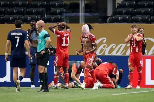 ATLANTA, GEORGIA - JULY 05: Players of FC Bayern Munchen react after Jamal Musiala #42 is injured during the FIFA Club World Cup 2025 quarter-final match between Paris Saint-Germain and FC Bayern München at Mercedes-Benz Stadium on July 05, 2025 in Atlanta, Georgia. (Photo by Alex Grimm/Getty Images)