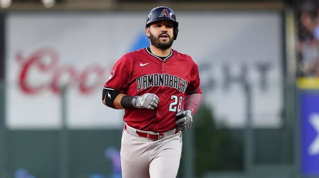 Jun 20, 2025; Denver, Colorado, USA; Arizona Diamondbacks third baseman Eugenio Suarez (28) runs off a solo home run in the fifth inning against the Colorado Rockies at Coors Field. Mandatory Credit: Ron Chenoy-Imagn Images