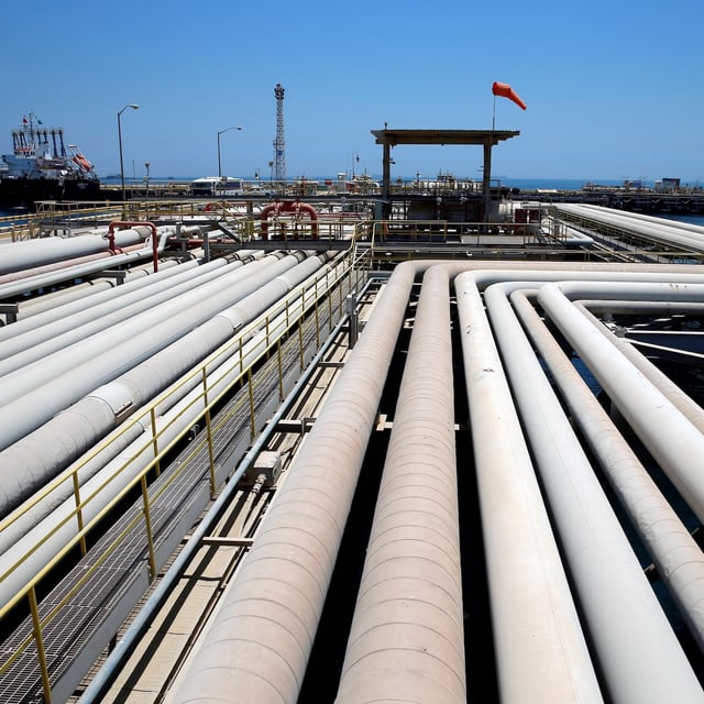 Saudi Aramco's Ras Tanura oil refinery and oil terminal in Saudi Arabia. Though the actual output increase of oil has been less than planned, most it is from Saudi Arabia.
