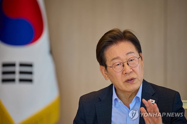 This photo provided by the presidential office on July 7, 2025, shows President Lee Jae Myung during a meeting with newly inaugurated Prime Minister Kim Min-seok in Seoul. (PHOTO NOT FOR SALE) (Yonhap)