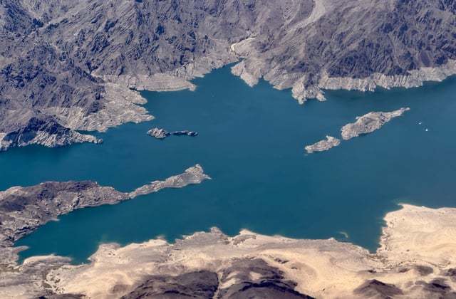 Aerial view of Boulder Basin, the northwestern arm of Lake Mead, shows the bathtub ring, indicator of long-term water loss, between Boulder City, Nevada, and the Las Vegas metropolitan area on July 3, 2025.