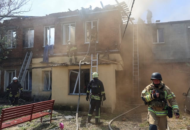 Rescuers work at the site of the Russian drone strike, amid Russia's attack on Ukraine, in Kharkiv, Ukraine July 7, 2025. REUTERS/Vyacheslav Madiyevskyy/File Photo