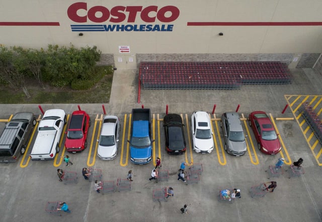 File: People wait in line for the Costco Wholesale at Bunker Hill Road to open Friday, March 13, 2020, in Houston. Several products sold at Costco were recalled in June. 