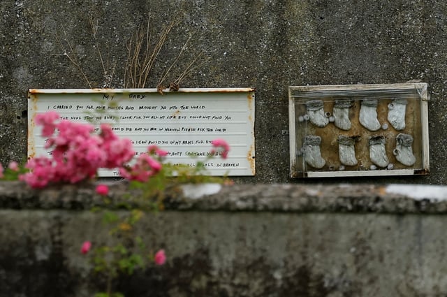 A memorial is put up at the Tuam graveyard, where the bodies of 796 babies were uncovered at the site of a former Catholic Church-run Bon Secours Mother and Baby Home, in Tuam, Ireland, July 7, 2025. REUTERS/Clodagh Kilcoyne