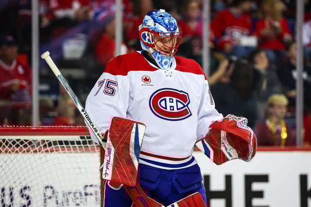 Mar 8, 2025; Calgary, Alberta, CAN; Montreal Canadiens goaltender Jakub Dobes (75) guards his net against the Calgary Flames during the second period at Scotiabank Saddledome. Mandatory Credit: Sergei Belski-Imagn Images/File Photo