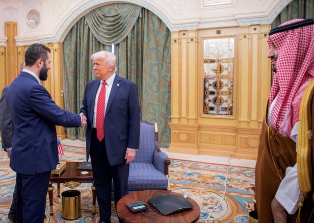 US President Donald Trump (C) met with Syria's interim president Ahmed al-Sharaa (L), a former Islamist guerilla commander, during a visit to Riyadh on May 14