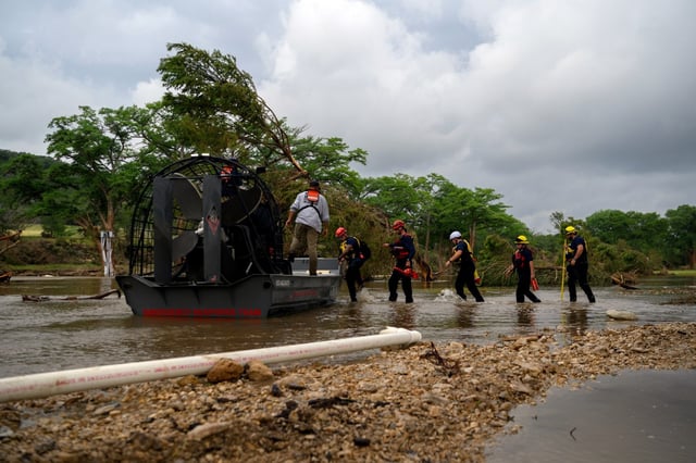 Members of a search and rescue team board an airboat in Kerrville, Texas, on Monday, July 7, 2025.  Camp Mystic, the all-girls Christian summer camp hit by the catastrophic flooding in Central Texas, confirmed on Monday that at least 27 campers and counselors had died, calling the disaster an Òunimaginable tragedy.Ó (Callaghan OÕHare/The New York Times)