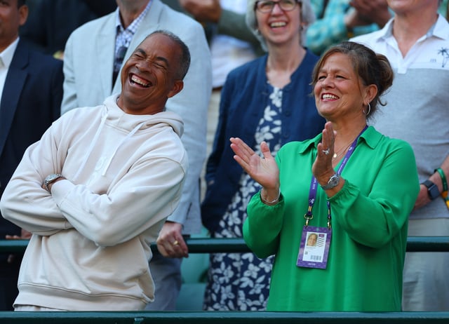 Tennis - Wimbledon - All England Lawn Tennis and Croquet Club, London, Britain - July 7, 2025 Bryan Shelton and Lisa Witsken Shelton, parents of Ben Shelton of the U.S. celebrate in the stands after Ben Shelton wins the round of 16 match against Italy's Lorenzo Sonego REUTERS/Isabel Infantes