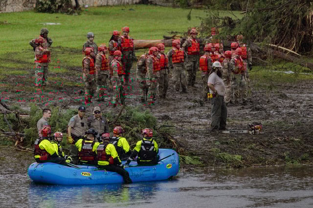 On July 6, 2025, search and recovery workers dig through debris looking for any survivors or remains of people swept up in flash flooding at Camp Mystic, in Hunt, Texas.