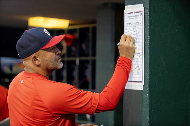 Jun 11, 2024; Detroit, Michigan, USA; Washington Nationals bench coach Miguel Cairo (22) makes changes to his lineup in the eighth inning against the Detroit Tigers at Comerica Park. Mandatory Credit: David Reginek-USA TODAY Sports/File Photo