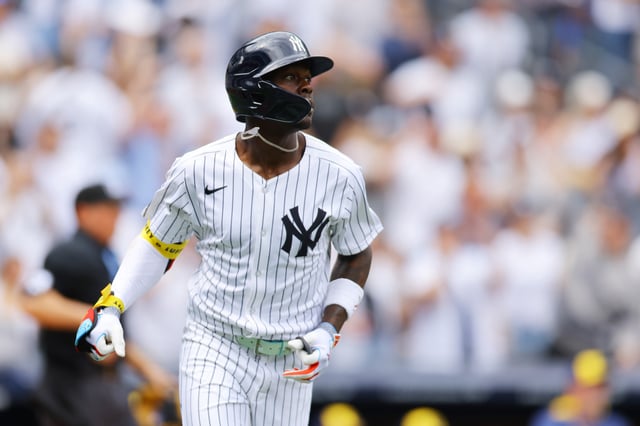 NEW YORK, NEW YORK - MARCH 29: Jazz Chisholm Jr. #13 of the New York Yankees hits a home run in the third inning against the Milwaukee Brewers at Yankee Stadium on March 29, 2025 in New York City.