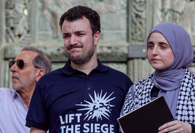 Mahmoud Khalil stands with his wife Noor Abdalla