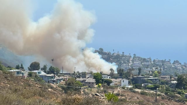 A brush fire broke out Monday near Rancho Laguna Road and Morningside Drive in Laguna Beach.  (Photo by Daniel Pearson, Contributing Photographer)