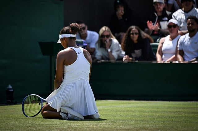 Japan's Naomi Osaka after a missed point against Russia's Anastasia Pavlyuchenkova during their women's singles third round tennis match at the 2025 Wimbledon Championships on July 4, 2025.  