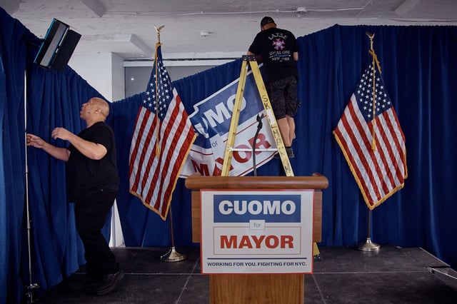 Workers dismantle the stage during Andrew Cuomo's election-night watch party for the Democratic primary in New York City on June 24.