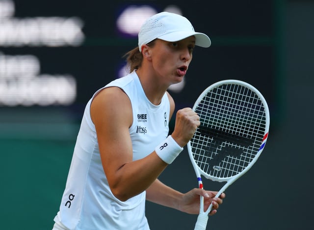 Tennis - Wimbledon - All England Lawn Tennis and Croquet Club, London, Britain - July 7, 2025 Poland's Iga Swiatek reacts during her round of 16 match against Denmark's Clara Tauson REUTERS/Isabel Infantes