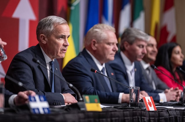 Prime Minister Mark Carney, left, speaks to media following the First Minister’s Meeting in Saskatoon, Sask., Monday, June 2, 2025. THE CANADIAN PRESS/Liam Richards