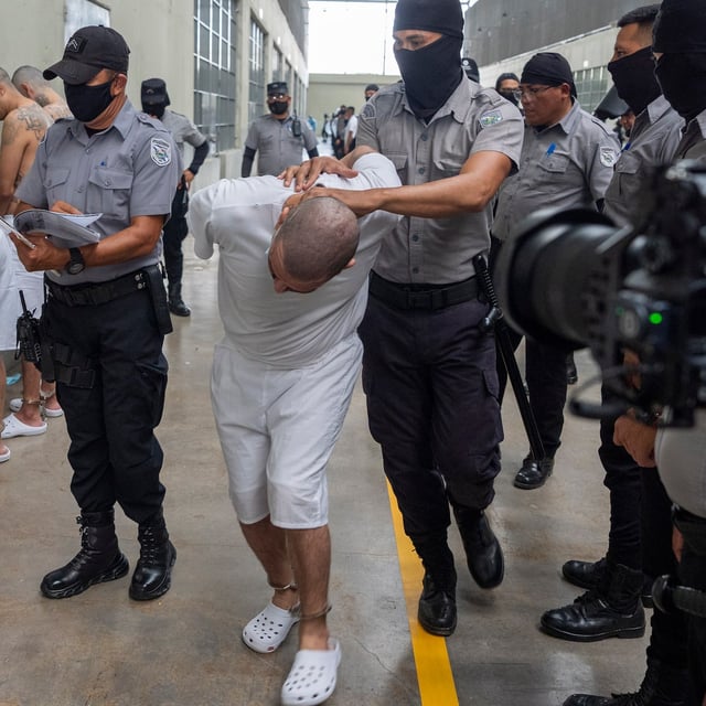 FILE - A prisoner is moved as Homeland Security Secretary Kristi Noem tours of the Terrorist Confinement Center in Tecoluca, El Salvador, March 26, 2025. (AP Photo/Alex Brandon, File)