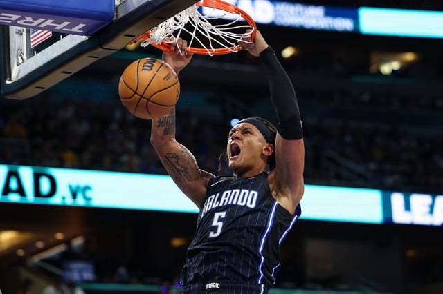 Magic forward Paolo Banchero slams in two of his 50 points in Monday's game against the Pacers.