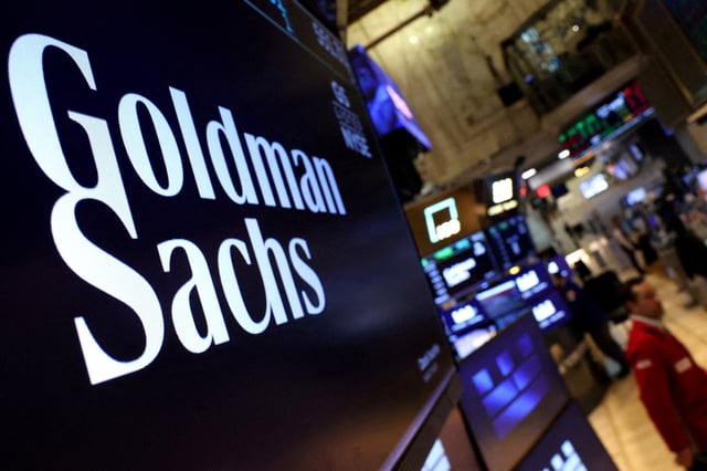 A screen displays the the company logo for Goldman Sachs on the floor at the New York Stock Exchange (NYSE) in New York City, U.S., May 7, 2025.  REUTERS/Brendan McDermid/File Photo