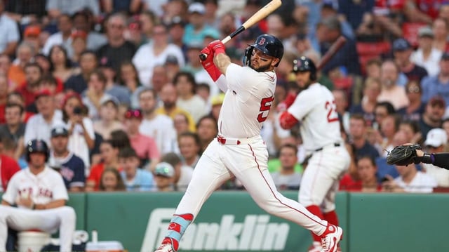 Jul 7, 2025; Boston, Massachusetts, USA; Boston Red Sox right fielder Wilyer Abreu (52) hits an RBI double during the second inning against the Colorado Rockies at Fenway Park. Mandatory Credit: Paul Rutherford-Imagn Images