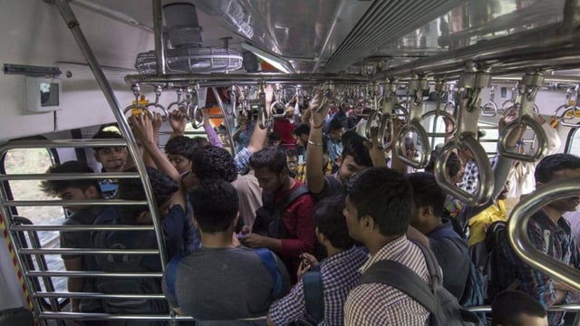 Mumbai, India - January 30, 2020: People travel from Central Railways first Air conditioned EMU local train which goes from Panvel to Thane in Mumbai, India, on Thursday, January 30, 2020. (Photo by Pratik Chorge/Hindustan Times) (Pratik Chorge/HT Photo)