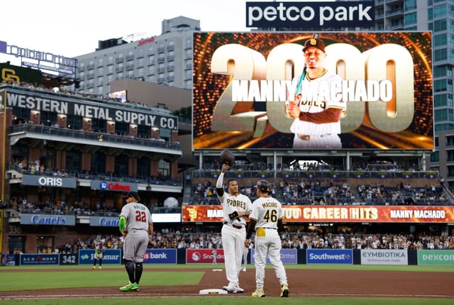 The Padres’ Manny Machado waves to the crowd after getting his 2,000th career hit in the fourth inning of Monday’s game  against the Diamondbacks at Petco Park on July 7, 2025 in San Diego, California. (Photo by K.C. Alfred / The San Diego Union-Tribune via Getty Images)