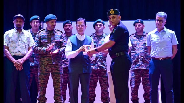 Captain Vikram Batra’s father, Girdhari Lal Batra, being felicitated at an event organised to commemorate the 26th Kargil Vijay Diwas, at DAV College, Sector-10, Chandigarh, on Monday. The PVC awardee’s brother, Vishal Batra (extreme right) was also feted. (HT)