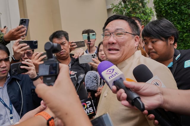 Thailand Deputy Finance Minister Julapun Amornvivat, second right, speaks to media at Government House in Bangkok, Thailand, Tuesday, July 8, 2025. (AP Photo/Sakchai Lalit)