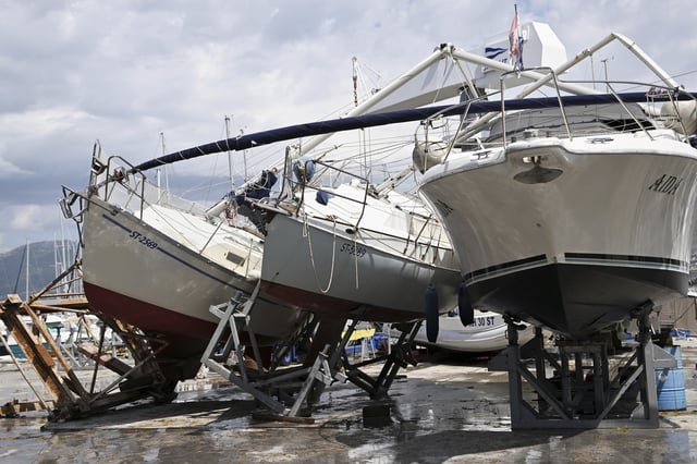 Boats are seen damaged in Split, Croatia, Tuesday, July 8, 2025, following a powerful storm. (AP Photo/Tom Dubravec)