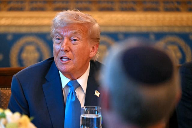 US President Donald Trump meets with unseen Israeli Prime Minister Benjamin Netanyahu at the Blue Room of the White House in Washington, DC, on July 7, 2025.