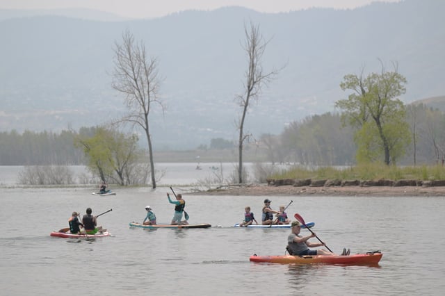 Kayakers and paddleboaders float at Chatfield State Park in Littleton, Colorado on Tuesday, July 23, 2024. (Photo by Hyoung Chang/The Denver Post)