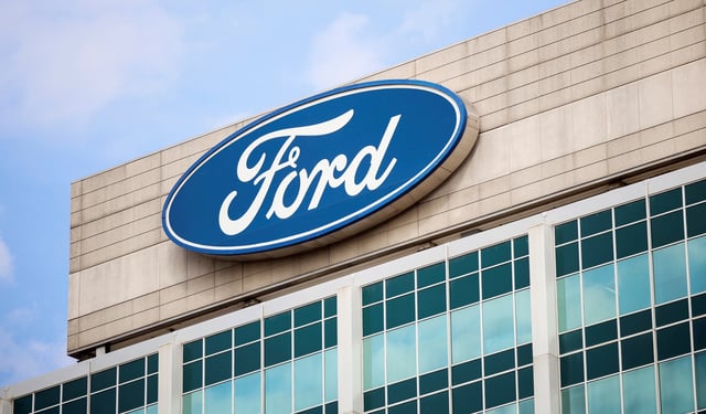 A Ford logo is seen on the Ford Motor World headquarters in Dearborn, Michigan, U.S., March 12, 2025. REUTERS/Rebecca Cook/File Photo