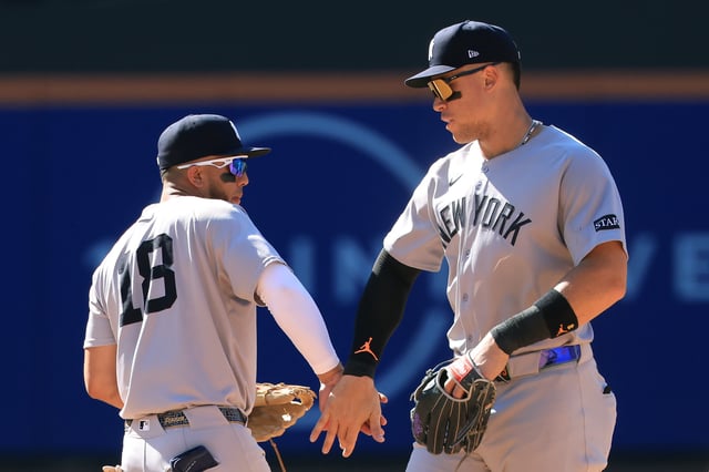 NEW YORK, NEW YORK - JULY 06: Aaron Judge #99 of the New York Yankees celebrates with Oswald Peraza #18 after defeating the New York Mets at Citi Field on July 06, 2025 in New York City.