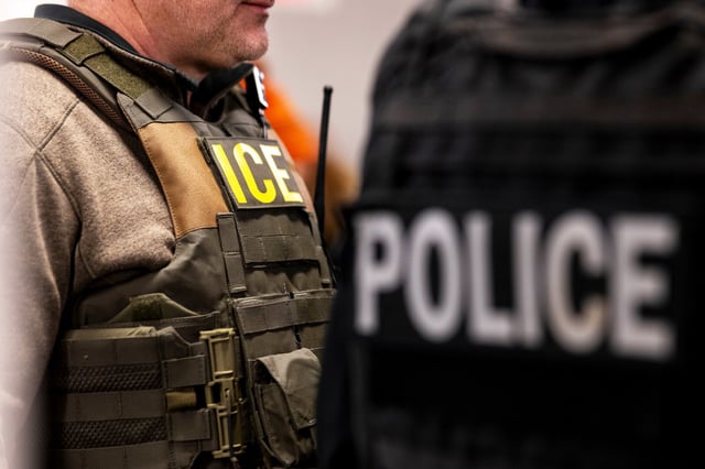 US Immigration and Customs Enforcement (ICE) agents, along with other federal law enforcement agencies, attend a pre-enforcement meeting in Chicago, Illinois, US, on Sunday, Jan. 26, 2025.