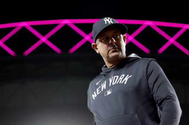 SEATTLE, WASHINGTON - MAY 13: Manager Aaron Boone #17 of the New York Yankees is thrown out of the game during the ninth inning against the Seattle Marinersat T-Mobile Park on May 13, 2025 in Seattle, Washington. (Photo by Steph Chambers/Getty Images)