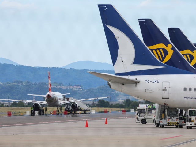 Aircrafts are seen at Milan Bergamo Airport, after flight operations were temporarily suspended when a person died on a runway during take-off preparations, in Orio al Serio, near Bergamo, Italy, July 8, 2025. REUTERS/Claudia Greco
