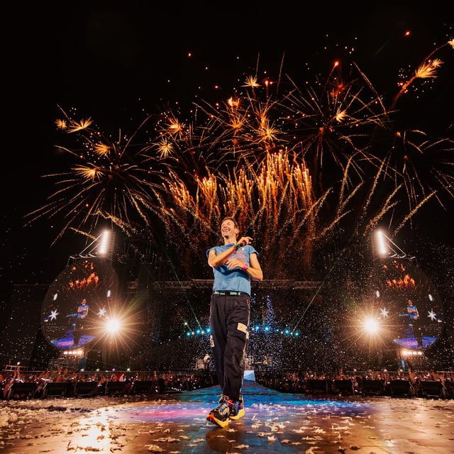 Lead singer Chris Martin performs with his band, Coldplay at Rogers Stadium north of Toronto on July 7, 2025.
