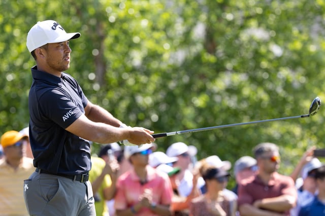 Jun 20, 2025; Cromwell, Connecticut, USA; Xander Schauffele plays his shot from the first tee during the second round of the Travelers Championship golf tournament. Mandatory Credit: Bill Streicher-Imagn Images/File Photo