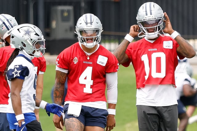 Jun 10, 2025; Arlington, TX, USA;  Dallas Cowboys quarterback Dak Prescott (4) reacts during a practice drill at the Ford Center at the Star Training Facility in Frisco, Texas. Mandatory Credit: Chris Jones-Imagn Images/File Photo