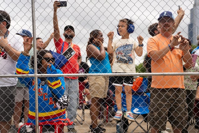Fans watch as racers come around Turn 1 during the NASCAR Cup Series Grant Park 165 on July 6, 2025. (Audrey Richardson/Chicago Tribune)