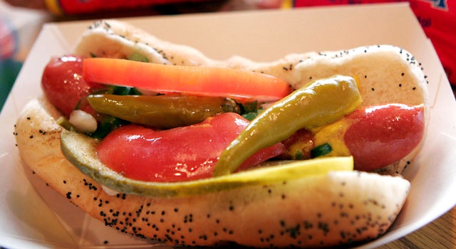 CHICAGO – JUNE 4: A Vienna Beef hot dog is prepared “Chicago style” at the company’s retail store June 4, 2005 in Chicago, Illinois. Vienna Beef recently signed a deal with Target Corp. to sell the company’s hot dogs at its 1,350 Target store food courts and packaged for retail in the 1,000 Target stores that sell groceries. The deal will mark the first time the Chicago-produced hot dogs have been available nationwide in the company’s 100+ year history. (Photo by Scott Olson/Getty Images)