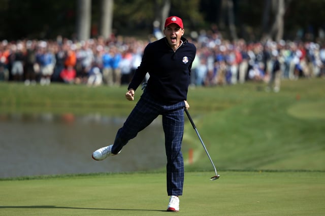 Keegan Bradley celebrates on the 15th green after he made birdie to defeat the team of Donald/Garcia 4&amp;3 during the Morning Foursome Matches for The 39th Ryder Cup at Medinah Country Club on September 28, 2012 in Medinah, Illinois.