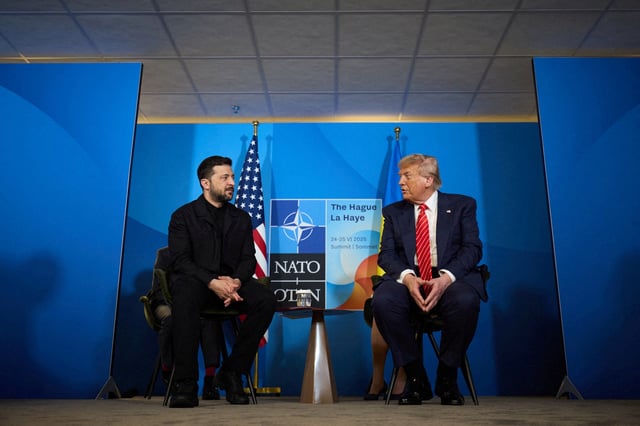 U.S. President Donald Trump and Ukraine's President Volodymyr Zelenskiy attend a meeting at the NATO summit in The Hague, Netherlands June 25, 2025. Ukrainian Presidential Press Service/Handout via REUTERS/File Photo